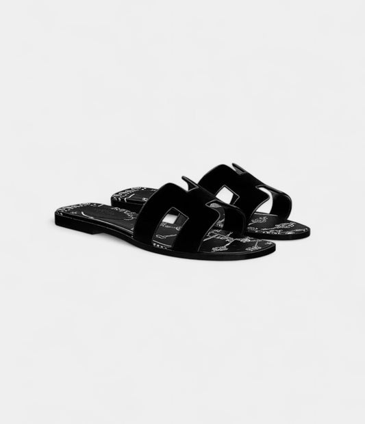 Hermès Oran Stylish Sandals for Women in Black & White Suede Slide