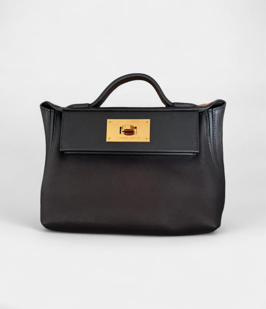 Hermès 24/24 Handmade Black & Gold Leather Bag with Palladium Hardware