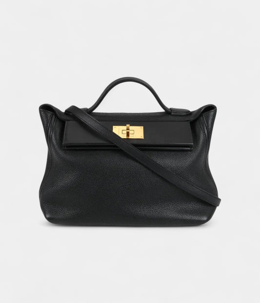 Hermès 24/24 Handmade in Black and Gold-Tone Leather with Palladium Hardware