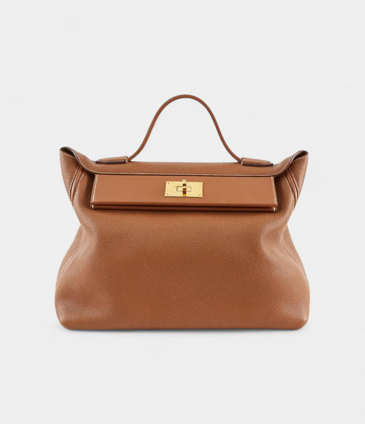 Hermès 24/24 Handmade in Gold Leather with Palladium Hardware