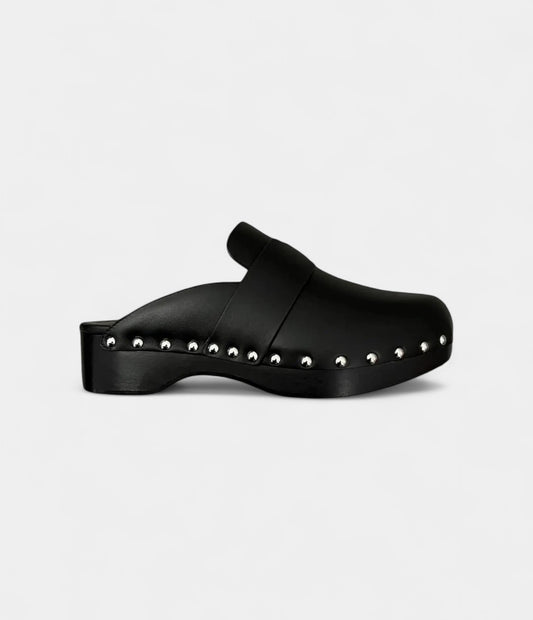 Hermès Calya Leather Mules & Clogs Timeless Elegance in Every Step