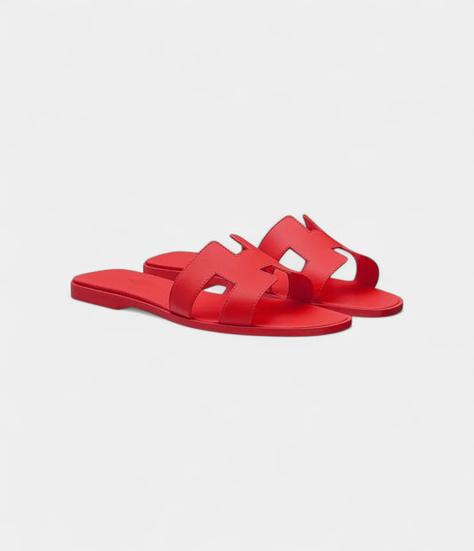 Hermès Oran Sandals for Women In Heart Red in Top Grain Cow Leather