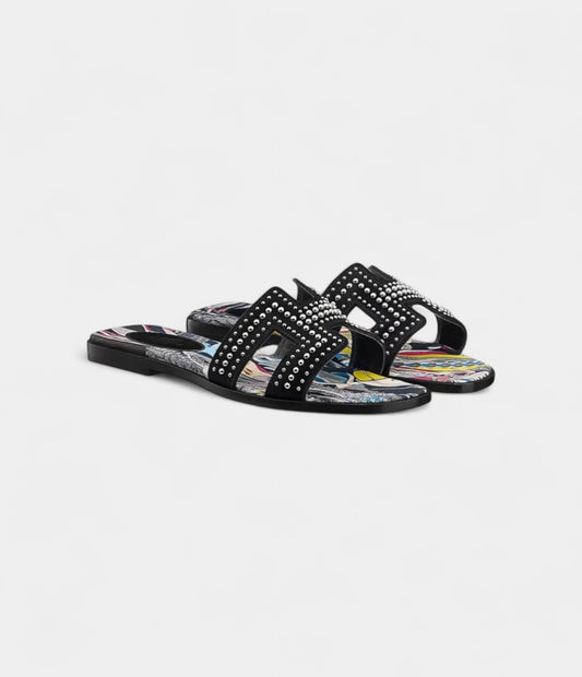 Hermès Oran Sandals for Women in Black Resistant Slide Leather