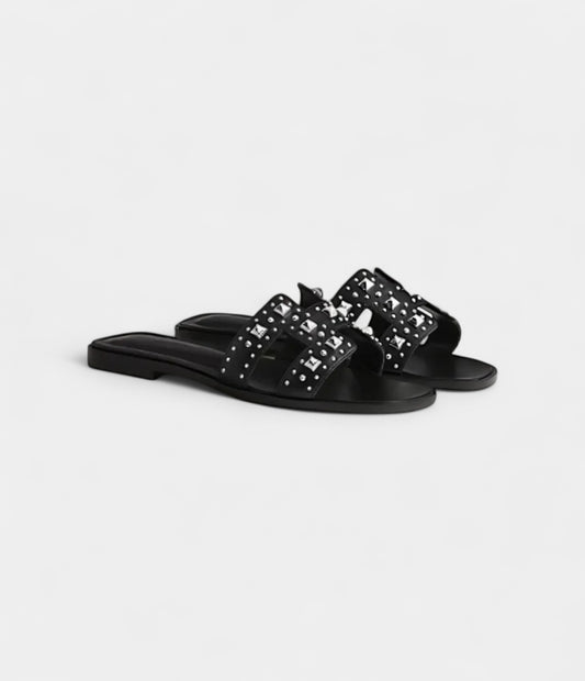 Hermès Oran Sandals for Women in Black & Silver Leather