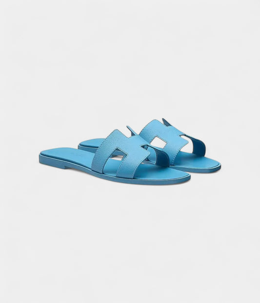 Hermès Oran Stylish Sandals for Women Enamel Blue Top Grain Cow Leather